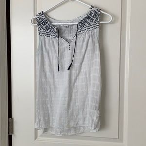 tank with blue embroidery